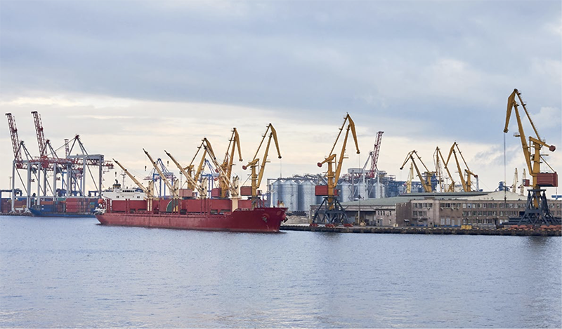 Barges and cranes at piers